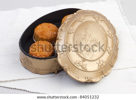 Moon cakes in beautiful box, traditional dessert for the Chinese mid autumn festival