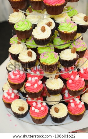 Wedding cup cakes look colorful at reception