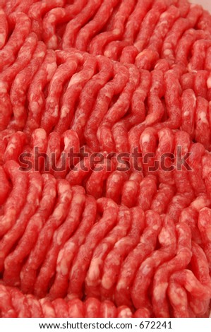 raw ground beef focus in center of photo to fade 762