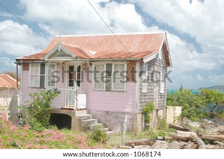 typical Caribbean gingerbread house in Windward Carriacou Island of country of Grenada