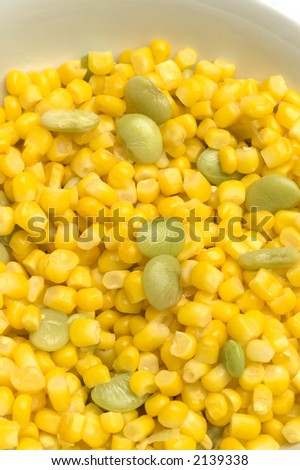 succotash mixture corn niblets and lima beans green vegetables in a bowl