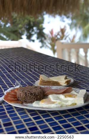 nicaraguan central america breakfast rice beans ham eggs by the caribbean sea