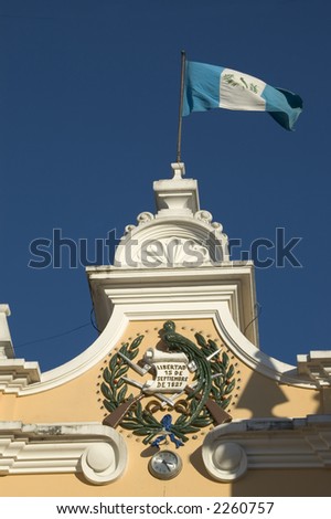 liberty sign on historic building with flag guatemala city