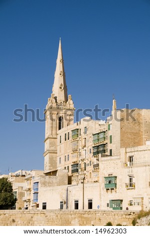 view historic buildings grand harbor three cities senglea vittoriosa  cospicua and st. john\'s cathedral grand master\'s palace valletta malta europe mediterranean