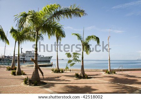promenade walkway in the waterfront development program on the gulf of paria caribbean sea in port of spain trinidad and tobago with view of tobago commuter ferry terminal