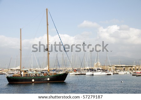 classic wood sailboats yachts in harbor of tourist city ajaccio corsica france in the mediterranean sea