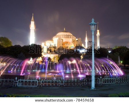 the Hagia Sophia mosque museum with fountain night scene with lights Istanbul Constantinople Turkey