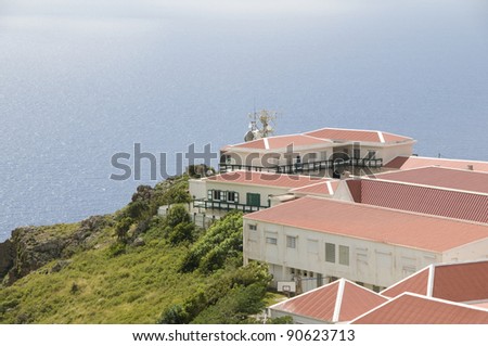 village typical house business school architecture on cliff over Caribbean Sea on \