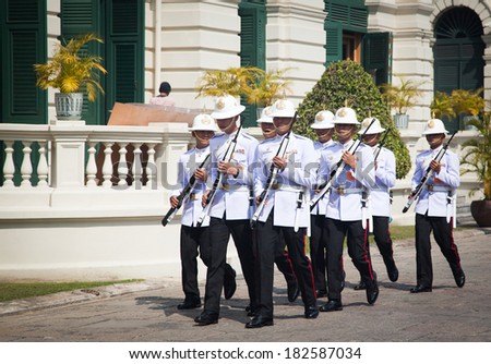BANGKOK - JANUARY 21: Parade of the kings Guards, in the Grand Palace, Changing the Guard on January 21, 2014 in Bangkok, Thailand, Grand Palace