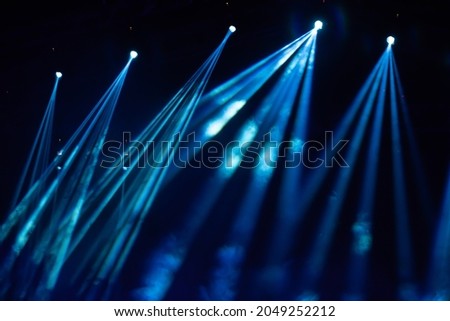 Stage light with colored spotlights and smoke. Concert and theatre scene