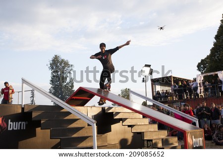BONTIDA - JUNE 21: Unidentified BMX rider making a bike jump during the BMX Competition, at Electric Castle Festival on June 21, 2014 in the Banffy castle in Bontida, Romania