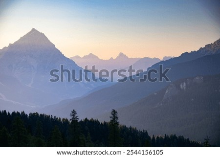 Similar – Image, Stock Photo Mountain peak against sunset sky
