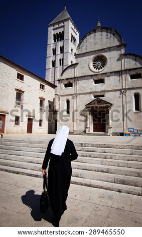 Nun going to church in Zadar, Croatia
