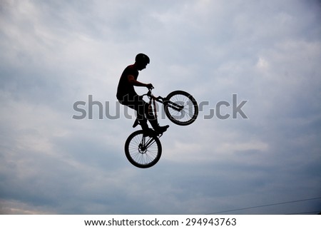 BONTIDA, ROMANIA - JUNE 27, 2015: Unidentified BMX rider making a bike jump during the BMX Competition, at Electric Castle Festival.