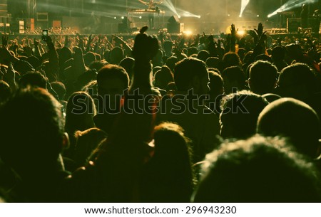 BONTIDA, ROMANIA - JUNE 28, 2015: Crowd of partying people at Electric Castle festival, one of the biggest music festivals in Romania.