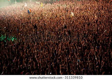 CLUJ-NAPOCA, ROMANIA - AUGUST 3, 2015: Crowd having fun during a live concert at Untold Festival in the European Youth Capital city