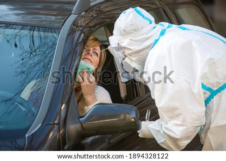 Similar – Image, Stock Photo Coronavirus drive-thru PCR test