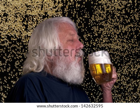 Beer ecstasy - eldelry beared man drinking a beer with bubbling in the background