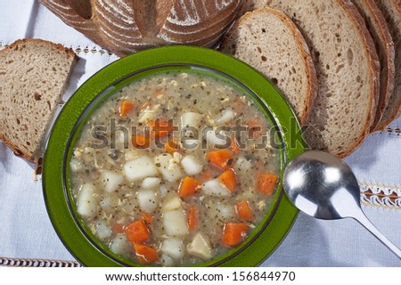 Soup - homemade potato soup with carrot and bread