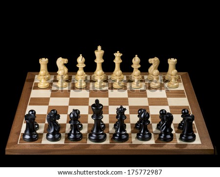Chess game - white and black pawns, figures on the chess board