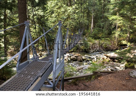 Foot bridge with metal grid on the floor