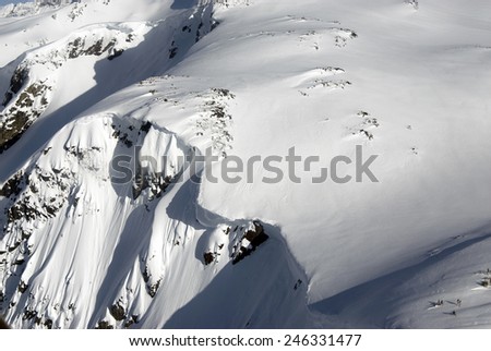 Coast Mountains, snowy peaks, rocks and slopes, British Columbia, Canada