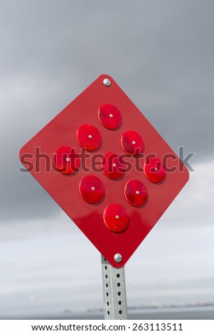 Red reflective sign
