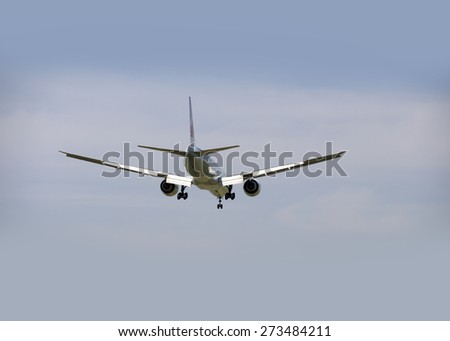 AIR CANADA - MAY 31, 2014: Boeing 777-333, the new two jet engine aricraft was photographed before landing in Vancouver, British Columbia, Canada. The airliner Air Canada cpompany was founded in 1936.