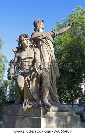 PRAGUE - JULY 9: Famous sculpture \'Premysl a Libuse\' from artist Josef Vaclav Myslbek (1881), is placed in the Vysehrad park by Peter and Paul Church, above Vltava River. Czech Republic,July 9, 2010.