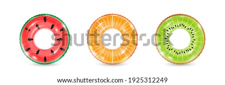 Inflatable rings looking like kiwi, orange and watermelon isolated on white background. Realistic colorful rubber swimming buoy. Vector illustration of top view at pool floater in fruit shape