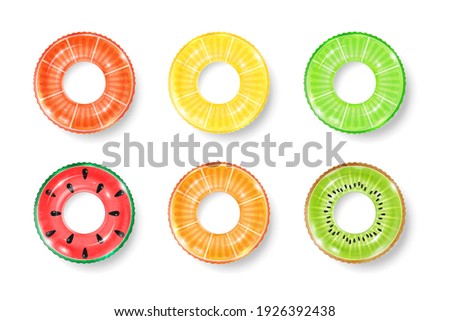 Inflatable rings looking like kiwi, orange and watermelon isolated on white background. Realistic colorful rubber swimming buoy. Vector illustration of top view at pool floater in fruit shape