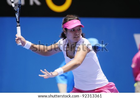 SYDNEY - JAN 9: China's Li Na hits a forehand in her first round match in the APIA Tennis International. Sydney - January 9, 2012