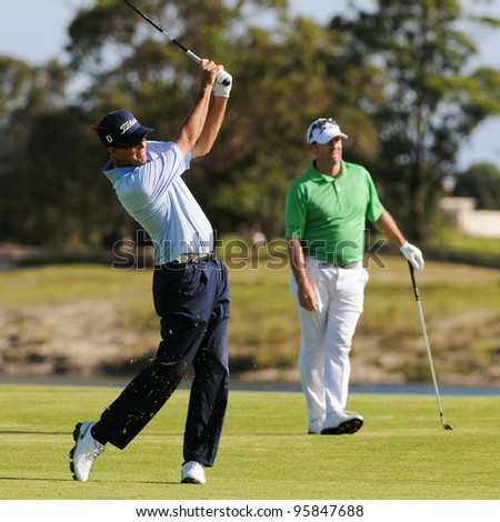 SYDNEY - NOV 11: Australian Stephen Leaney plays his second shot at the 17th in his second roound at the Emirates Australian Golf Open. Sydney - November 11, 2011