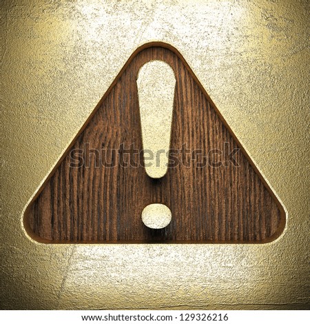golden sign on wooden wall