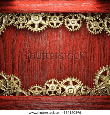 gear wheels on wooden background