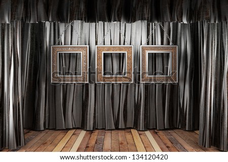 black silk curtain with frames on stage