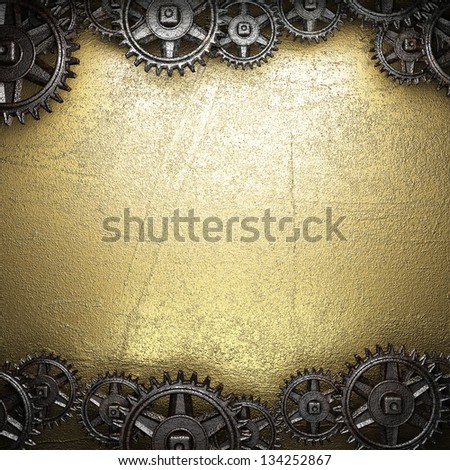 gear wheels on golden background