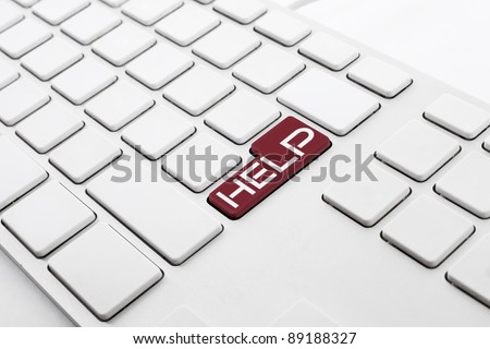 white keyboard with no letter, only with a red button for help