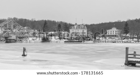 Goodspeed Opera House In Winter taken from the Haddam side of the Connecticut river.   Draw-bridge and Gelston house on either side.