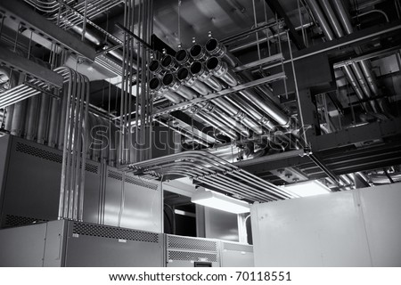 Electrical conduits for a 4000 ampere transfer switch,  black and white.
