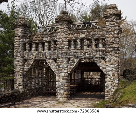 Gillette castle is a park in on the Connecticut River,  Old stone buildings part of an old mansion.