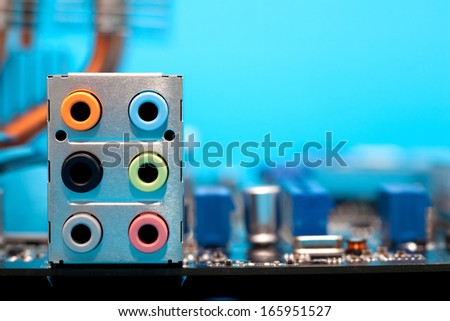 six colorful audio outputs on motherboard - computer part, macro shot