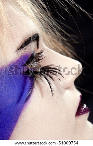 girls face with original make-up - fake eyelashes