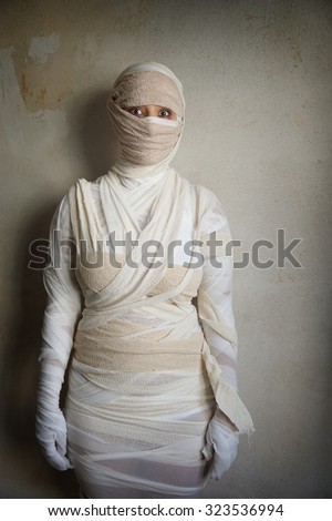 woman wrapped in bandages as egyptian mummy halloween costume