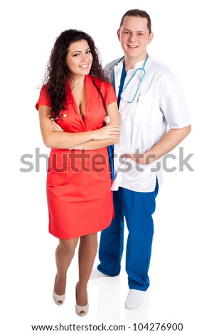 Young smiling couple of handsome man doctor and pretty nurse in blue, white and tangerine tango uniforms, looking at camera. Full body image, isolated on white background. Healthcare concept series.