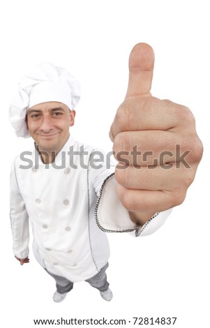 Happy young chef holding thumbs up. Distorted image taken in studio with fish eye lens. Isolated on pure white background.