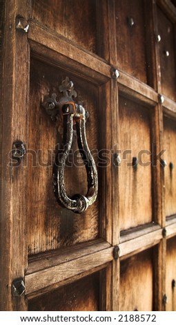 old panelled door and handle shallow DOF focus on handle