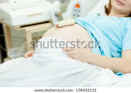 Pregnant woman in delivery room