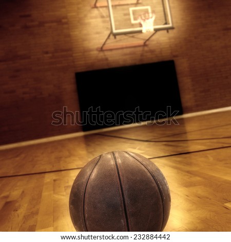 Basketball on floor of empty basketball court - Stock Image - Everypixel