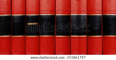 Close up of several volumes of books on bankruptcy